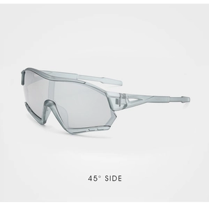 Detail view of children sports goggles featuring a gray translucent frame and curved lens