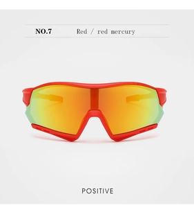 Close-up of red cycling goggles with red mercury lenses and ventilation side ports