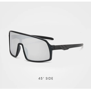 Detail of kids cycling glasses with black frame and silver mirrored lenses at 45 degree angle