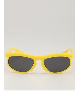 Front view of bright yellow kids sports sunglasses with dark lenses and sleek wrap design