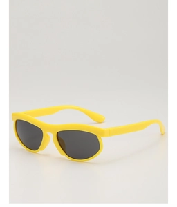 Detail view of bright yellow chunky sunglasses with high-quality dark grey UV lenses