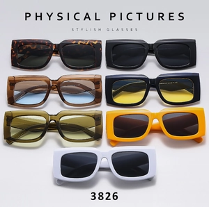 Group display of trendy rectangular sunglasses in multiple colors and vintage thick frames
