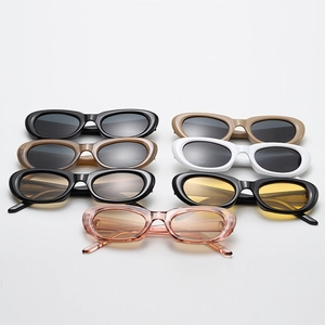 Collection of retro oval sunglasses in seven colors on a clean white background