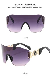 Detail of rimless shield sunglasses with gradient lenses and gold deer head logo on black arms