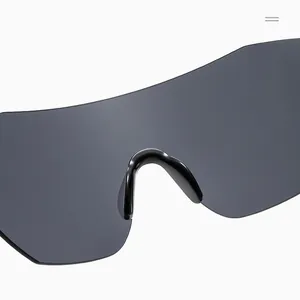 Close-up of ergonomic nose pads and integrated dark grey lenses on sports sunglasses