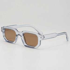Lunettes de soleil carrées bleues transparentes avec verres bruns style vintage