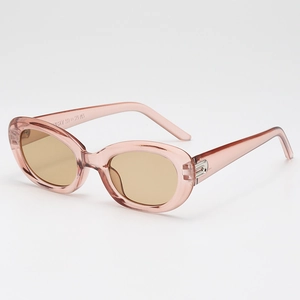 Retro small frame oval sunglasses with pink transparent frame and light brown lenses