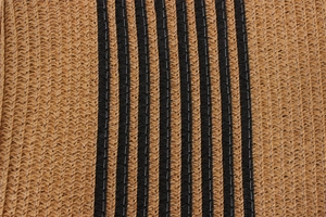 Detailed close-up of the dense woven texture and black contrast stripes on this tote bag