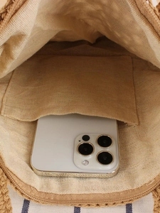 Handmade woven crochet bag with beige linen lining and internal pocket for smartphones