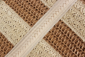 Macro detail of two-tone paper rope woven texture in beige and brown for large tote bag