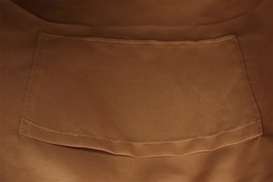 Detail of durable brown fabric lining and inner pocket with white contrast stitching