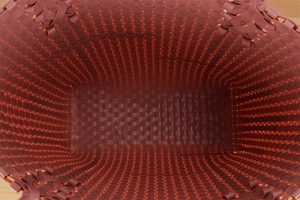 Vertical top view of deep red woven plastic basket showing interior structure and base
