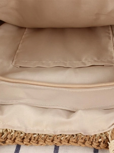 Vue intérieure du sac tissé vintage avec doublure textile et poche zippée pratique