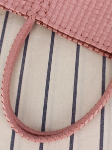 Pink macaron woven plastic handbag with compact handle for casual picnic use