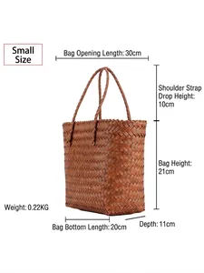 Brown handwoven straw handbag in small size with dimensions shown on white background