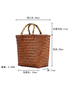 Retro brown woven straw handbag with natural bamboo handles and minimalist vintage style