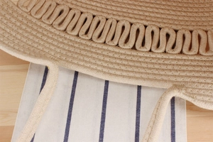 Détail d'un sac en corde de coton tissé main avec des motifs texturés ondulés en relief