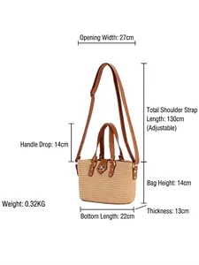 Handmade straw woven crossbody bag with brown leather handles and adjustable shoulder strap