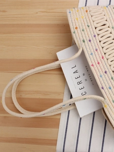 Sac de plage en corde de coton blanc de style français avec pompons colorés pour l'été