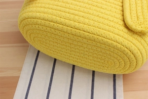 Detailed close-up showing the tight texture and thick cotton weave of the yellow storage bag