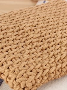 Handwoven khaki cotton rope shoulder bag featuring a square minimalist weave design