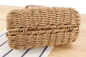 Détail de la texture en corde de papier tissée main et de la base d'un sac à main