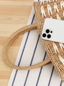 Handwoven straw tote bag with triple-color texture and sturdy round rope handles for summer