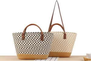 Detail of bohemian woven tote bags with leather handles and intricate cotton rope texture