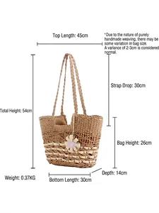 Bohemian handmade woven beach bag with dimensions 45x26cm and floral charm pendant