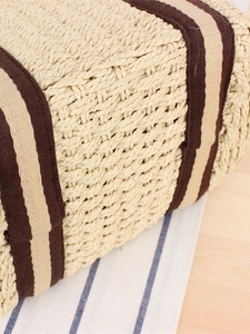 Minimalist straw woven tote bag with vintage striped ribbon detail for daily commute