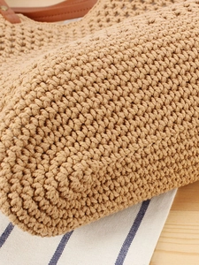 Sac fourre-tout minimaliste en corde de coton avec poignées en cuir et tissage