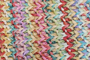 Close-up detail of multi-colored woven texture for vacation beach bags and casual totes