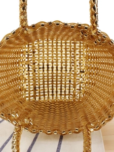 Sac fourre-tout tressé doré en plastique avec deux poignées, vue de dessus de l'intérieur
