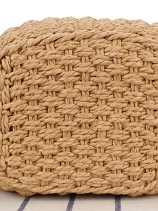 Handwoven straw bag detail with cross-weave pattern for beach and casual summer outings