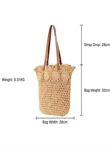 Handwoven straw tote bag with brown leather straps and detailed hollow pattern