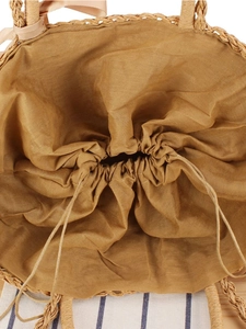 Bohemian paper straw woven beach bag with yellow drawstring liner and ribbon bow detail