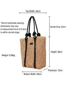 Large woven straw beach bag with black rope handles and detailed size dimensions