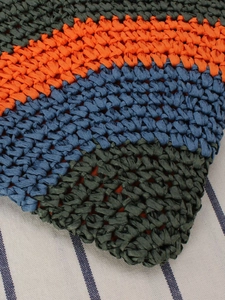 Handmade woven tote bag with orange, blue, and dark green raffia straw stripes