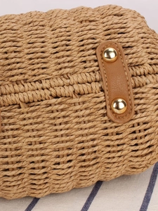 Chic paper rope woven crossbody bag with brown leather flap and golden rivet details