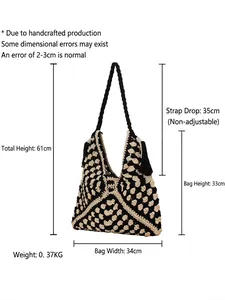 Borsa tote intrecciata a mano in nero e beige con dimensioni e nappe decorative