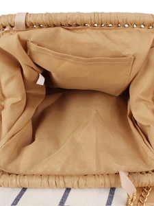 Woven paper rope beach bag with brown lining, golden chain strap and ribbon detail