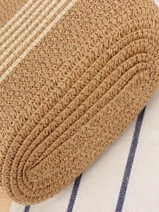 Woven straw summer beach bag with striped texture and durable handmade artisanal design