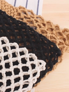 Handmade woven cotton rope beach bag in beige, black and white minimalist net design