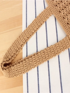 Minimalist handwoven cotton crochet tote bag with natural hollow knit shoulder strap
