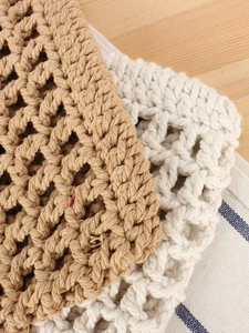 Bohemian style hollow mesh cotton rope tote bag in brown and cream for beach and vacation