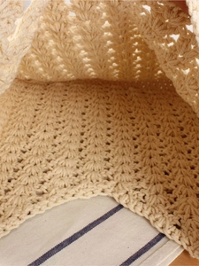 Minimalist woven cotton rope bag in cream white with intricate shell crochet texture