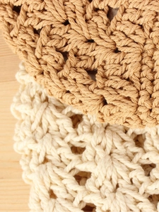 Minimalist cotton rope woven bag in brown and cream for beach holidays and casual style