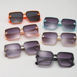 Detailed view of children's bee sunglasses in six colors with gradient lenses