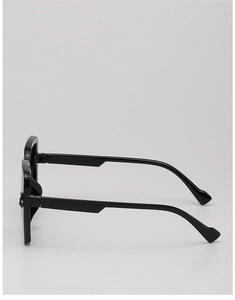 Detailed side view of black kids sunglasses featuring Greek fret patterns on the temples