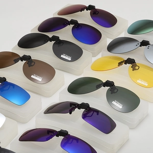 Detailed grid of assorted polarized TAC clip-on lenses in various colors and shapes